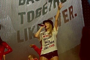 Taylor Swift performs during the first leg of The Eras Tour, where Travis Kelce originally expressed interest in getting to know Swift.